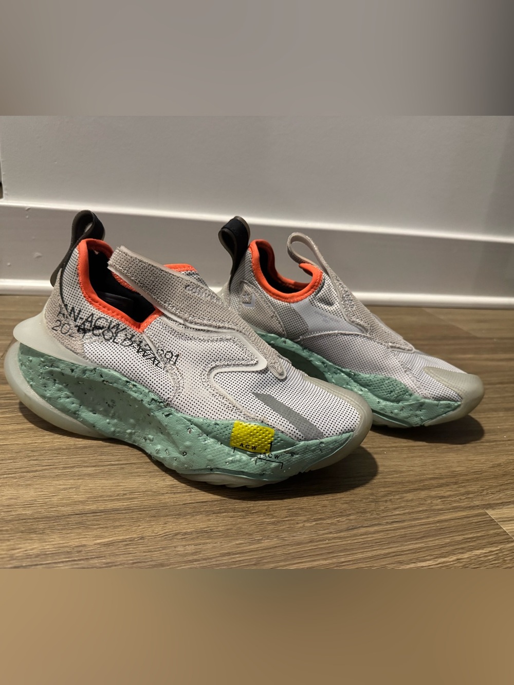 A-COLD-WALL* White Slip-On Sneakers with Mint Soles and Orange Trim